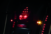 Load image into Gallery viewer, Kuryakyn Rear Turn Signal & License Plate Mount Indian Black