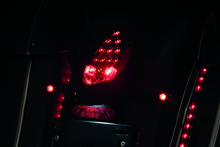 Load image into Gallery viewer, Kuryakyn Rear Turn Signal & License Plate Mount Indian Black