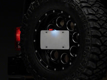 Load image into Gallery viewer, Raxiom 07-18 Jeep Wrangler JK Axial Series License Plate Bracket w/ LED Brake Light