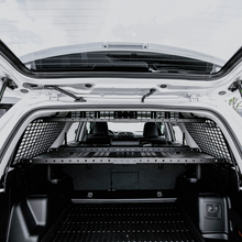 Load image into Gallery viewer, Cali Raised 10-24 Toyota 4Runner Interior Rear Molle Panel - 3 Row Seating/Both Sides &amp; Middle Tray