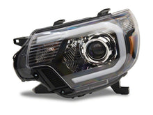 Load image into Gallery viewer, Raxiom 12-15 Toyota Tacoma Axial Projector Headlights w/ SEQL LED Bar- Blk Housing (Clear Lens)