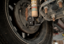 Load image into Gallery viewer, Cali Raised 05-23 Toyota Tacoma Rear Shock Skid Plates