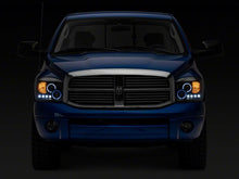 Load image into Gallery viewer, Raxiom 06-08 Dodge RAM 1500 LED Halo Projector Headlights- Blk Housing (Clear Lens)