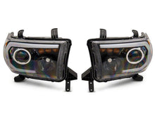 Load image into Gallery viewer, Raxiom 07-13 Toyota Tundra Axial Series Projector Headlights w/ LED Bar- Blk Housing (Clear Lens)