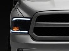 Load image into Gallery viewer, Raxiom 09-18 Dodge RAM 1500/2500/3500 Axial Headlights w/ SEQL LED Bar- Blk Housing (Clear Lens)