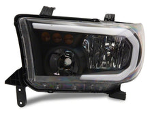 Load image into Gallery viewer, Raxiom 07-13 Toyota Tundra Axial Series Headlights w/ SEQL LED Bar- Blk Housing (Clear Lens)