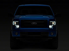Load image into Gallery viewer, Raxiom 09-14 Ford F-150 Axial G4 Light Bar Switchback Projector Headlights- Blk Housing (Clear Lens)