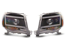 Load image into Gallery viewer, Raxiom 05-11 Toyota Tacoma Axial Series LED DRL Projector Headlights- Blk Housing (Clear Lens)
