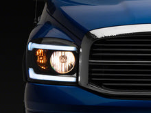 Load image into Gallery viewer, Raxiom 06-09 Dodge RAM 1500/2500/3500 Axial Headlights w/ SEQL LED Bar- Blk Housing (Clear Lens)