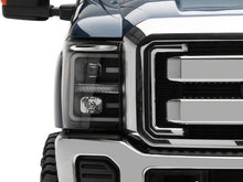 Load image into Gallery viewer, Raxiom 11-16 Ford F-250 Super Duty LED Projector Headlights - Blk Housing (Clear Lens)