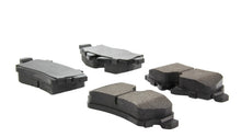 Load image into Gallery viewer, StopTech Performance 07-09 Mini Cooper/Cooper S Rear Brake Pads