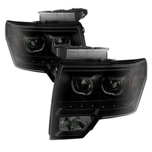 Load image into Gallery viewer, xTune Ford F150 09-14 Projector Headlights Halogen Model LED Halo Black Smoke PRO-JH-FF15009-CFB-BSM
