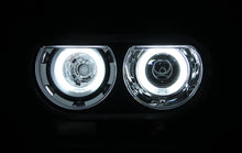 Load image into Gallery viewer, ANZO 2008-2014 Dodge Challenger Projector Headlights w/ Halo Black (CCFL) (HID Compatible)