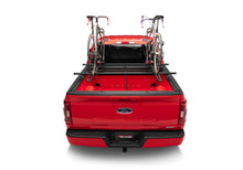 Load image into Gallery viewer, Roll-N-Lock 19-22 RAM 1500 (w/o Swing Gate - 67.4in. Bed) A-Series XT Retractable Tonneau Cover