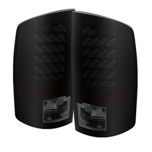 Load image into Gallery viewer, xTune Dodge Ram 02-06 1500 / Ram 2500/3500 03-06 LED Tail Light Black Smoke ALT-JH-DR02-LED-BKSM