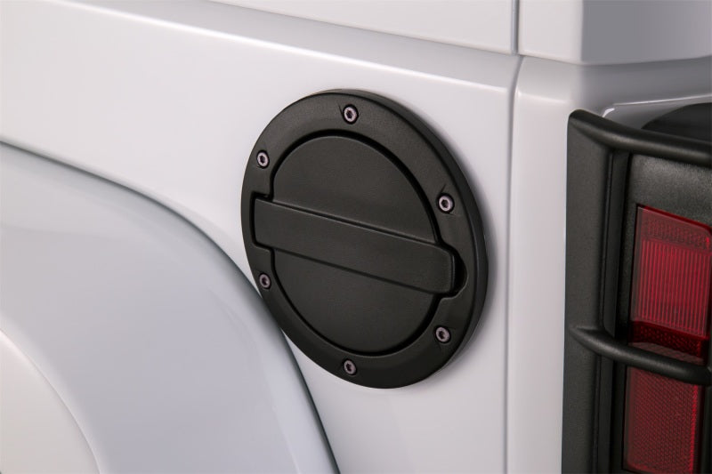 AMP Research 2007-2017 Jeep Wrangler JK 2/4 Door Fuel Door - Black - GTR Auto