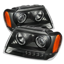 Load image into Gallery viewer, xTune Jeep Grand Cherokee 99-04 Projector Headlights LED Halo Black PRO-JH-JGC99-LED-BK