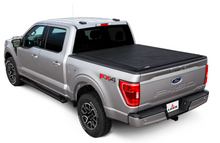 Load image into Gallery viewer, LEER 2014+ Toyota Tundra SR250 66TT14 6Ft6In Tonneau Cover - Rolling Full Size Standard Bed