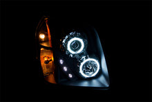 Load image into Gallery viewer, ANZO 2007-2014 GMC Yukon Projector Headlights w/ Halo Black (CCFL)
