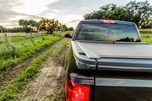 Load image into Gallery viewer, Roll-N-Lock 09-17 Dodge Ram 1500 XSB 67in A-Series Retractable Tonneau Cover