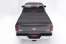 Load image into Gallery viewer, Extang 09-16 Dodge RamBox w/ Cargo Mgmt System (5ft 7in) Solid Fold 2.0