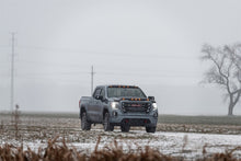 Load image into Gallery viewer, AVS 19-22 GMC Sierra 1500 Aeroskin Low Profile Hood Shield w/ Lights - Black