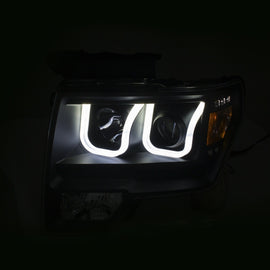 ANZO 2009-2014 Ford F-150 Projector Headlights w/ U-Bar Switchback Black w/ Amber