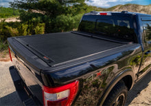 Load image into Gallery viewer, Roll-N-Lock 07-18 Toyota Tundra Regular Cab/Double Cab LB 95-15/16in M-Series Tonneau Cover