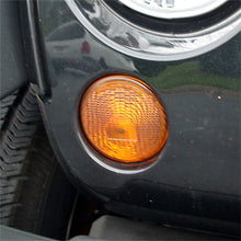 Load image into Gallery viewer, Omix Park Lamp Right Amber 07-13 Jeep Wrangler