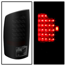 Load image into Gallery viewer, xTune Dodge Ram 02-06 1500 / Ram 2500/3500 03-06 LED Tail Light Black Smoke ALT-JH-DR02-LED-BKSM