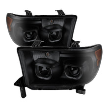 Load image into Gallery viewer, xTune Toyota Tundra 07-13 Projector Headlights Eliminates AFS LED Halo Smoked PRO-JH-TTUN07-CFB-BSM