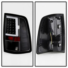 Load image into Gallery viewer, xTune 13-18 Dodge Ram 1500 LED Tail Lights - Black (ALT-ON-DRAM13V2-LBLED-BK)