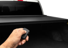 Load image into Gallery viewer, Roll-N-Lock 15-17 Ford F-150 65-5/8in E-Series Retractable Tonneau Cover