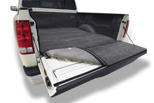 Load image into Gallery viewer, BedRug 04-15 Nissan Titan King Cab 6.5ft Bedliner