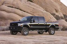 Load image into Gallery viewer, Fabtech 01-04 Ford F250/350 4WD 3.5in Spring Hanger w/Perf Shks