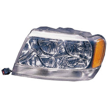 Load image into Gallery viewer, Omix Left Headlight 99-04 Jeep Grand Cherokee (WJ)