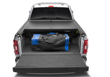 Load image into Gallery viewer, Roll-N-Lock 15-18 Ford F-150 SB 77-3/8in Cargo Manager