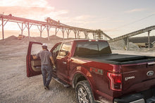 Load image into Gallery viewer, Roll-N-Lock 15-18 Ford F-150 SB 77-3/8in A-Series Retractable Tonneau Cover