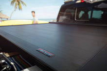 Load image into Gallery viewer, Roll-N-Lock 16-17 Toyota Tacoma Double Cab 60-1/2in E-Series Retractable Tonneau Cover