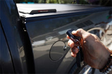 Load image into Gallery viewer, Roll-N-Lock 07-17 Toyota Tundra Crew Max Cab 65in E-Series Retractable Tonneau Cover