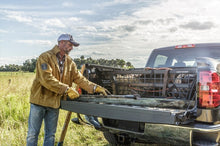 Load image into Gallery viewer, Roll-N-Lock 07-18 Toyota Tundra Crew Max Cab XSB 65in Cargo Manager