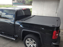 Load image into Gallery viewer, Roll-N-Lock 16-18 Nissan Titan XD Crew Cab SB 77-3/8in M-Series Retractable Tonneau Cover