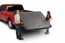 Load image into Gallery viewer, UnderCover 99-16 Ford F-250/F-350 6.8ft SE Bed Cover - Black Textured