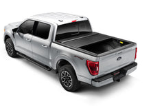 Load image into Gallery viewer, Roll-N-Lock 15-17 Ford F-150 65-5/8in E-Series Retractable Tonneau Cover