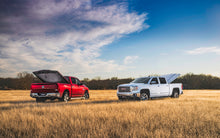 Load image into Gallery viewer, Undercover 19-20 GMC Sierra 1500 (w/ MultiPro TG) 6.5ft Elite LX Bed Cover - Glory Red